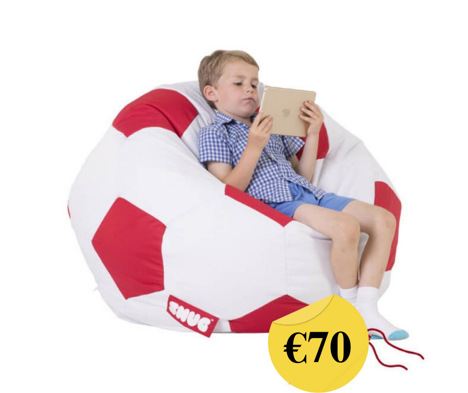 Kid sitting on a bean bags for kids and playing on a tablet device