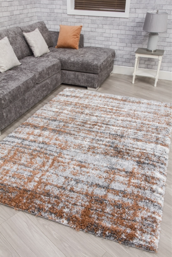 Fantasy Shimmer Orange Shaggy Rug - MacCarthys