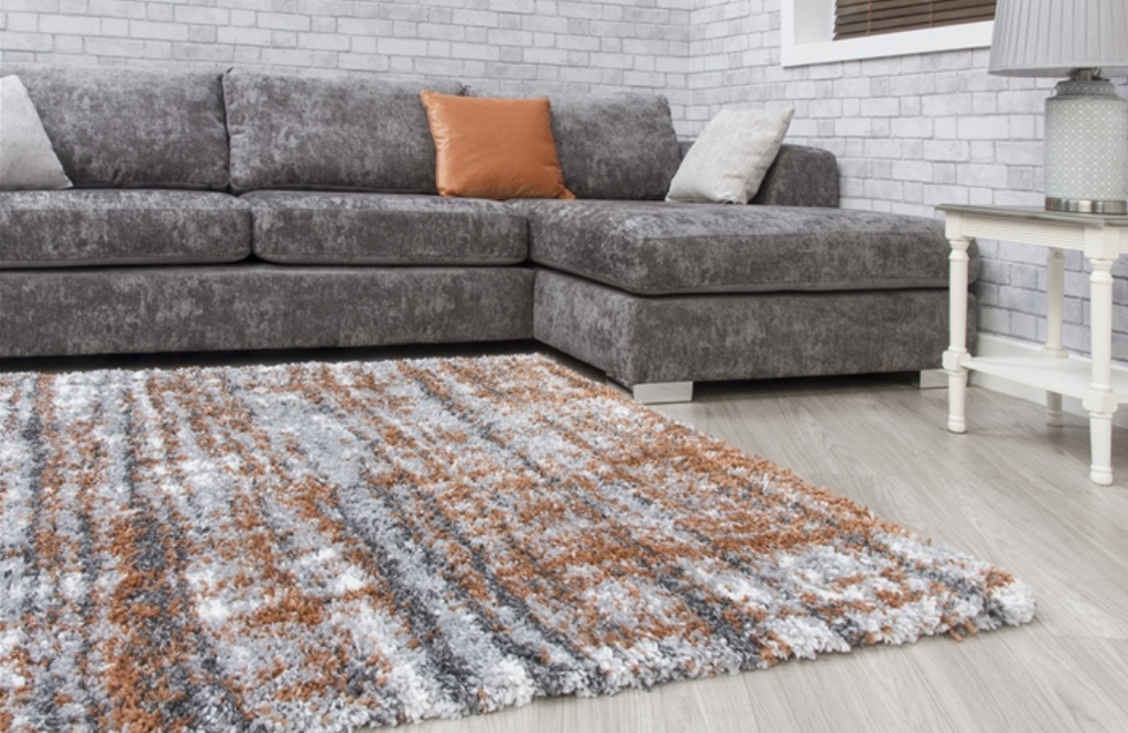 Fantasy Shimmer Orange Shaggy Rug - MacCarthys