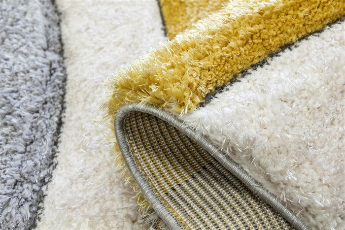 Luxus Ripple 3D Shaggy Rug - Ochre - MacCarthys